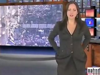 Brunette Beauty Strips Nude During A News Broadcast